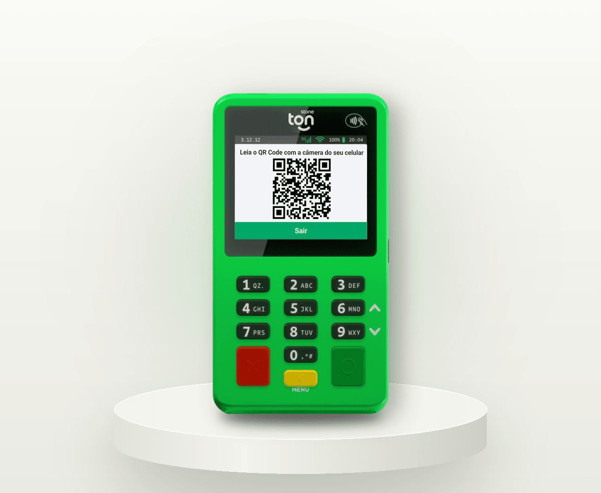 Maquininha Ton T2 verde, de frente, com tela colorida mostrando um QR Code Pix e teclado numérico