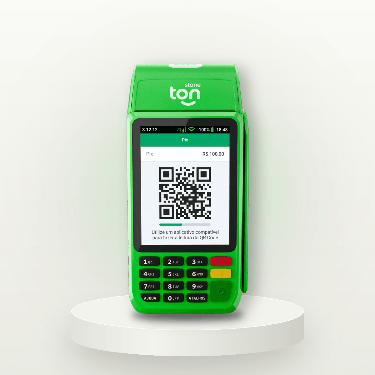 Maquininha Ton T3 verde, de frente, com impressora no topo e tela mostrando um QR Code Pix